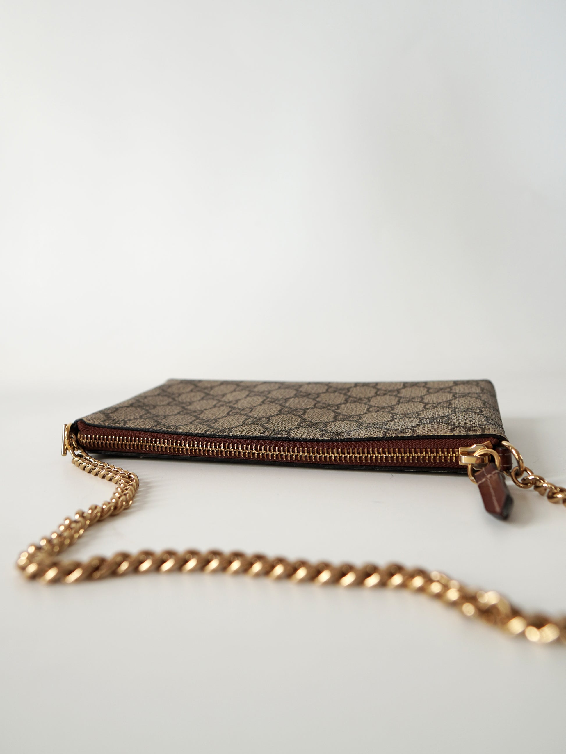 Gucci Supreme Monogram Wrist Wallet