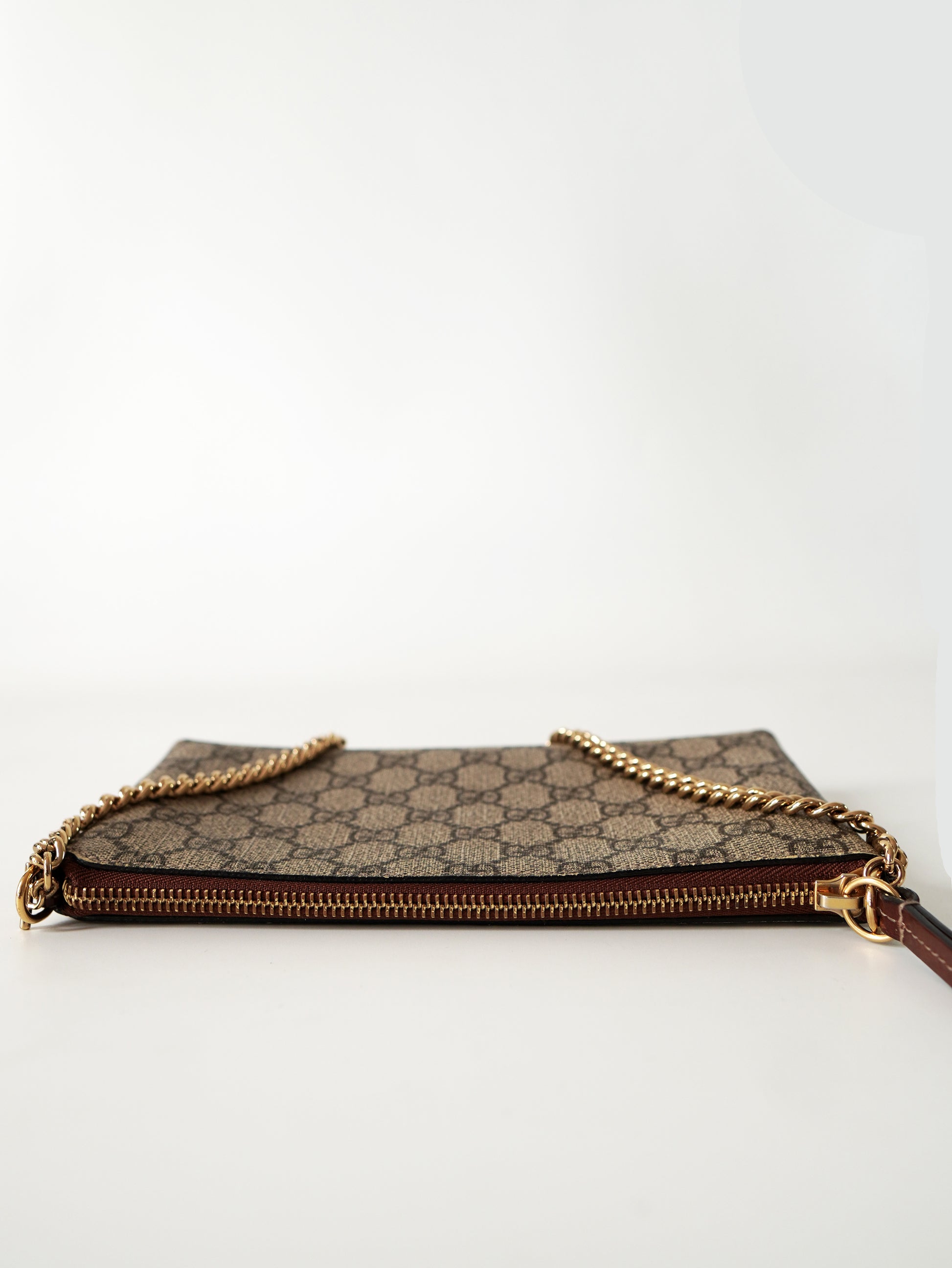 Gucci Supreme Monogram Wrist Wallet