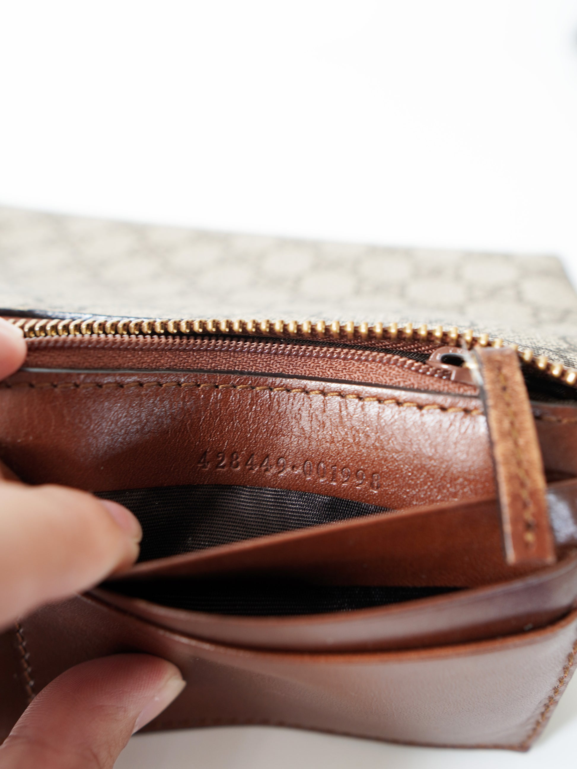 Gucci Supreme Monogram Wrist Wallet