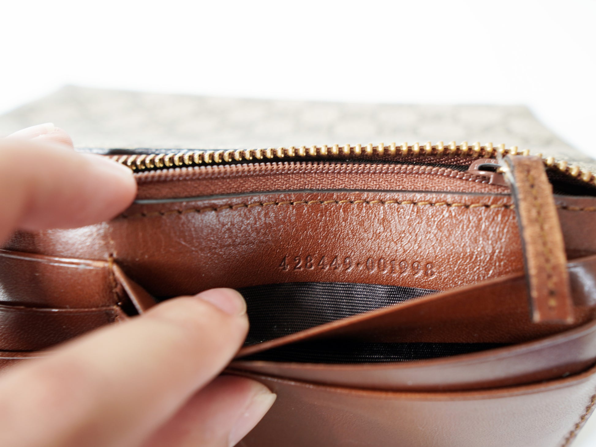 Gucci Supreme Monogram Wrist Wallet