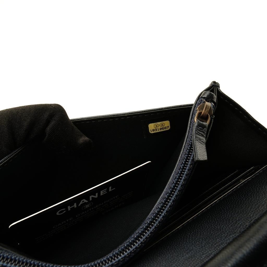 Chanel Camellia Wallet on Chain Midnight Blue