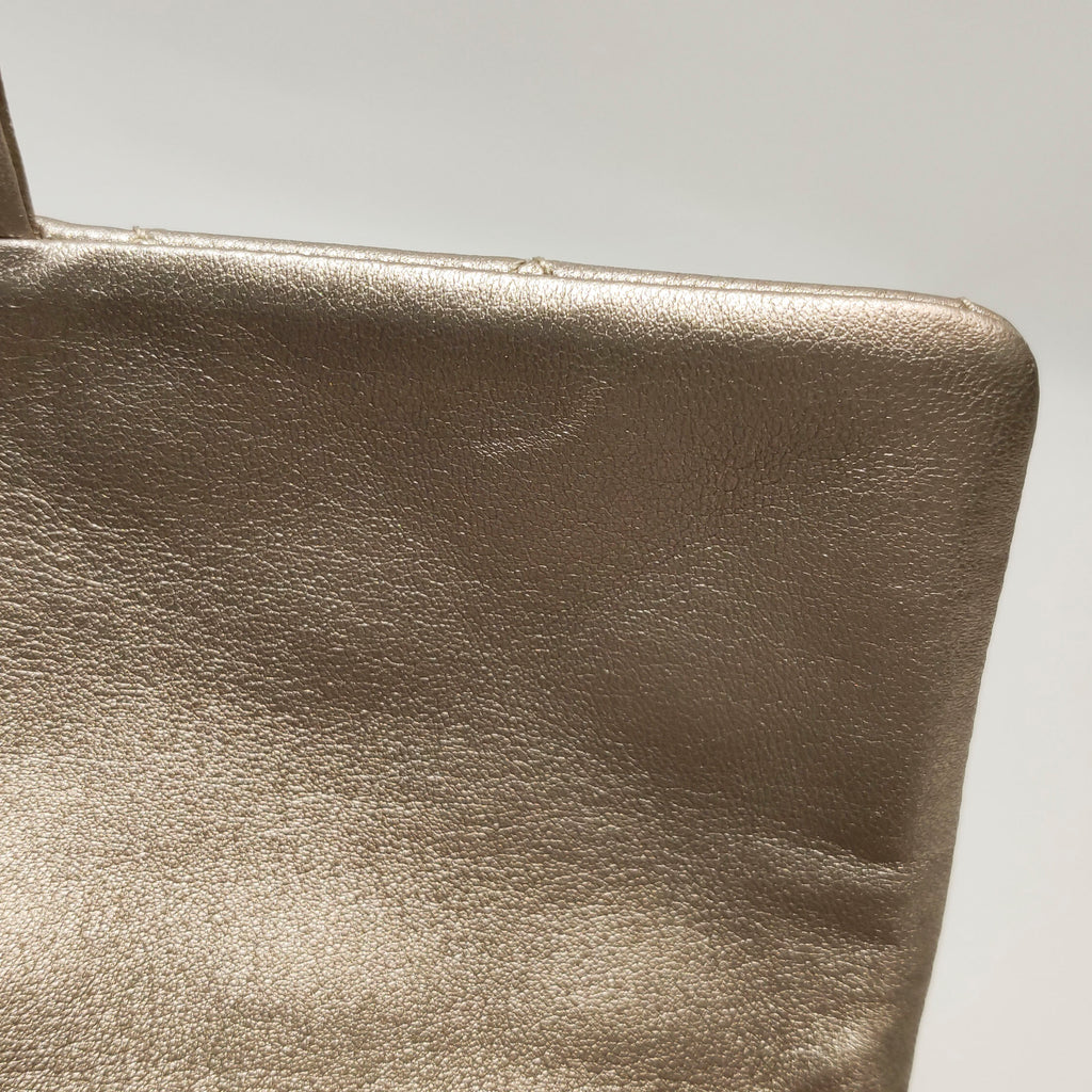 Chanel Quilted Roll 2.55 Reissue Clutch Light Gold Iridescent Calfskin