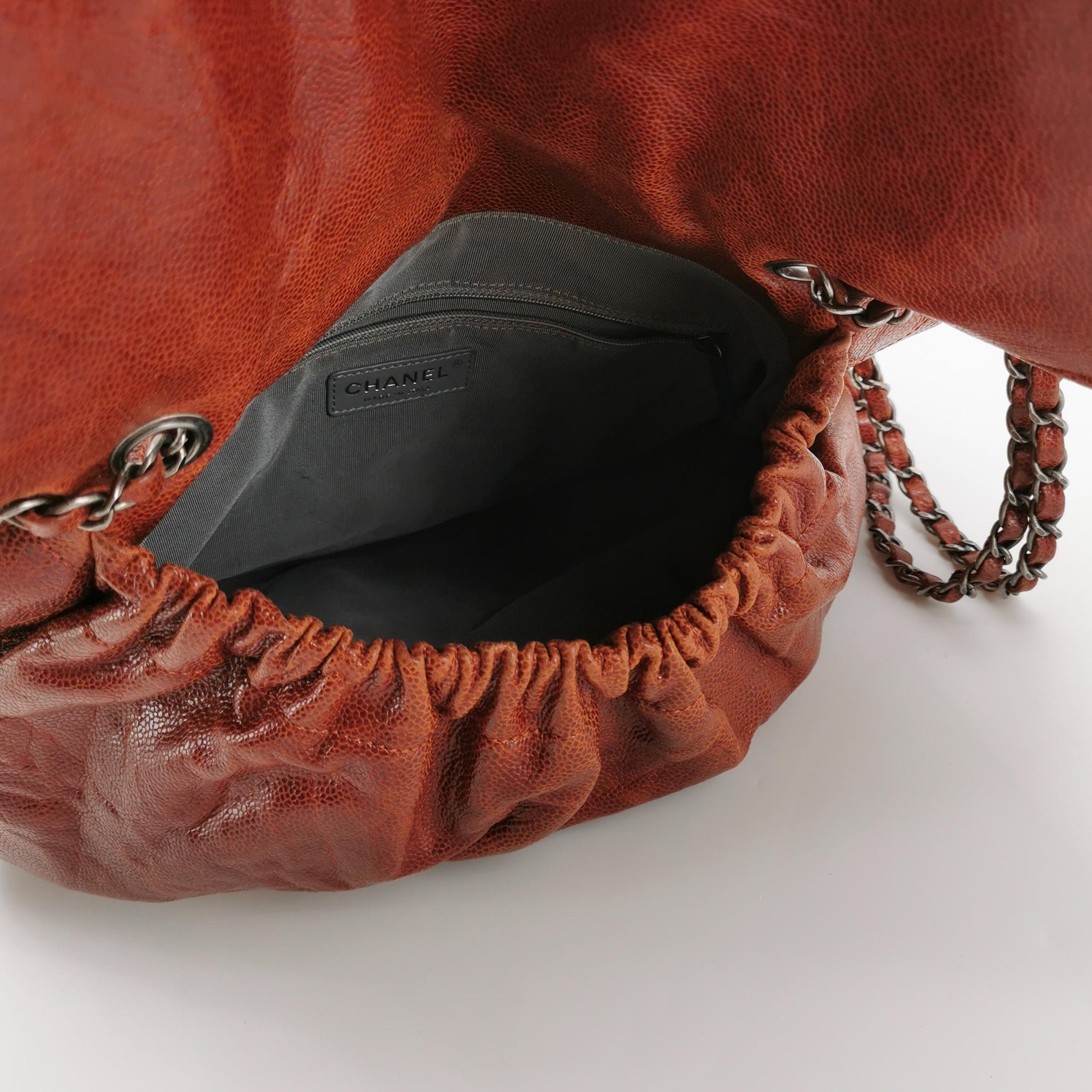 Chanel Maxi Elastic Flap Crumpled Caviar Rust