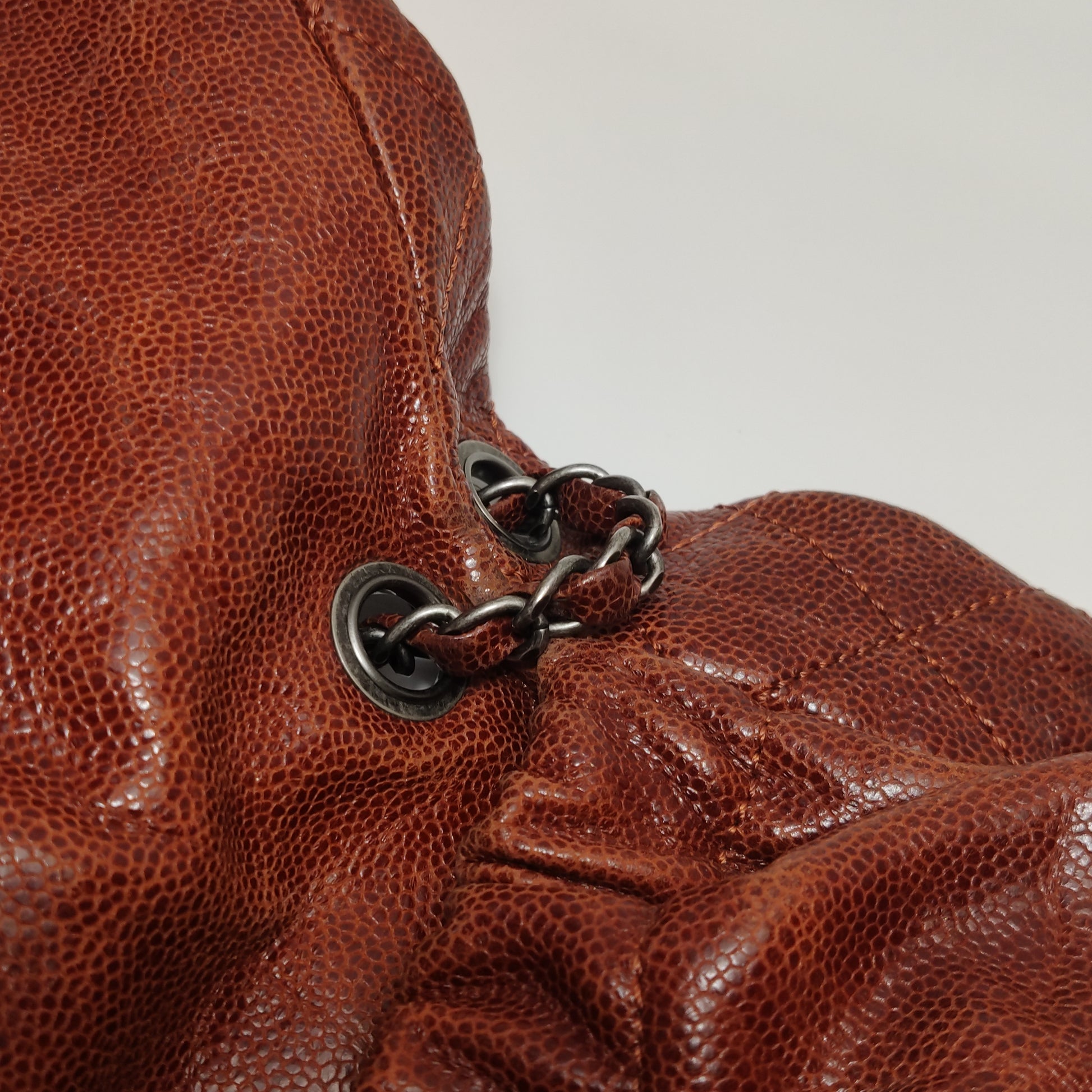 Chanel Maxi Elastic Flap Crumpled Caviar Rust