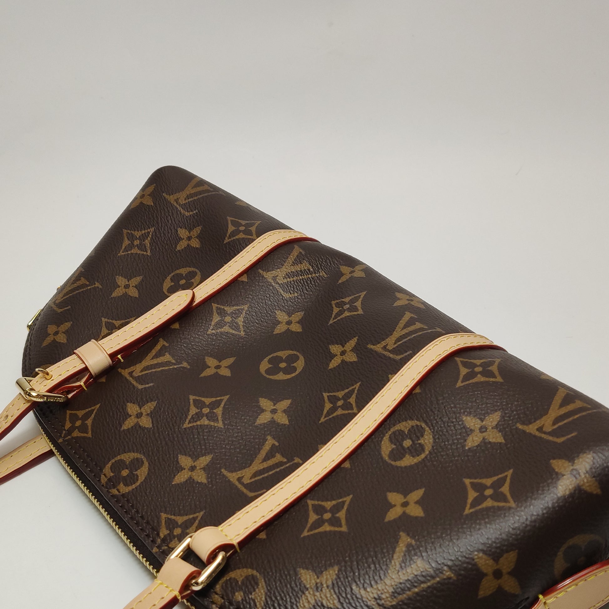 Louis Vuitton Squire East West Monogram