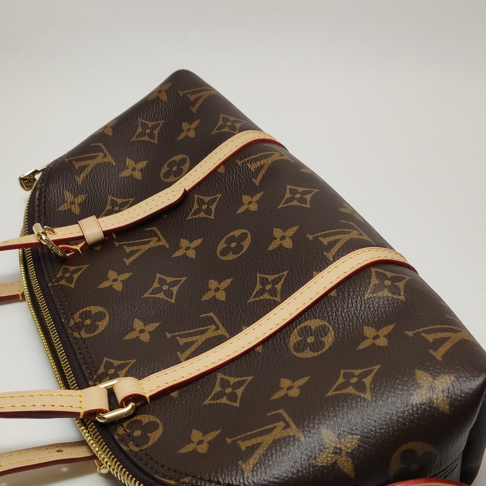 Louis Vuitton Squire East West Monogram
