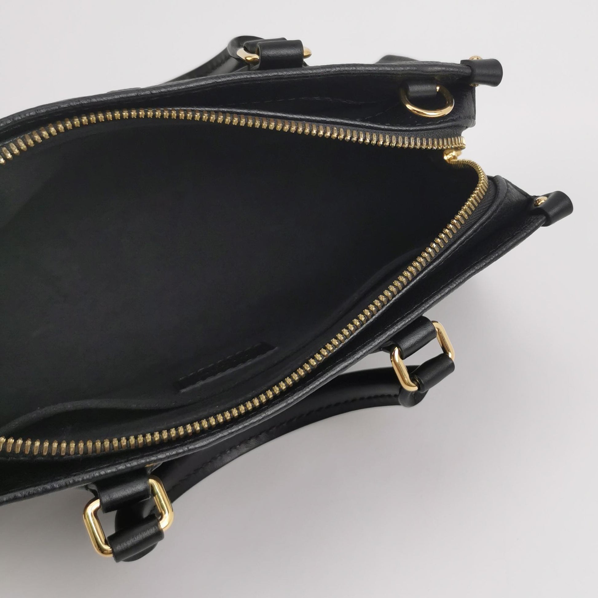 Louis Vuitton On The Go East West Empreinte