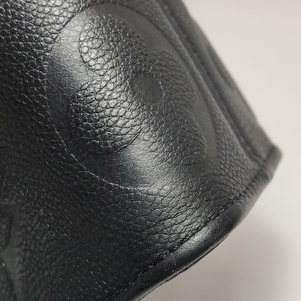 Louis Vuitton On The Go East West Empreinte