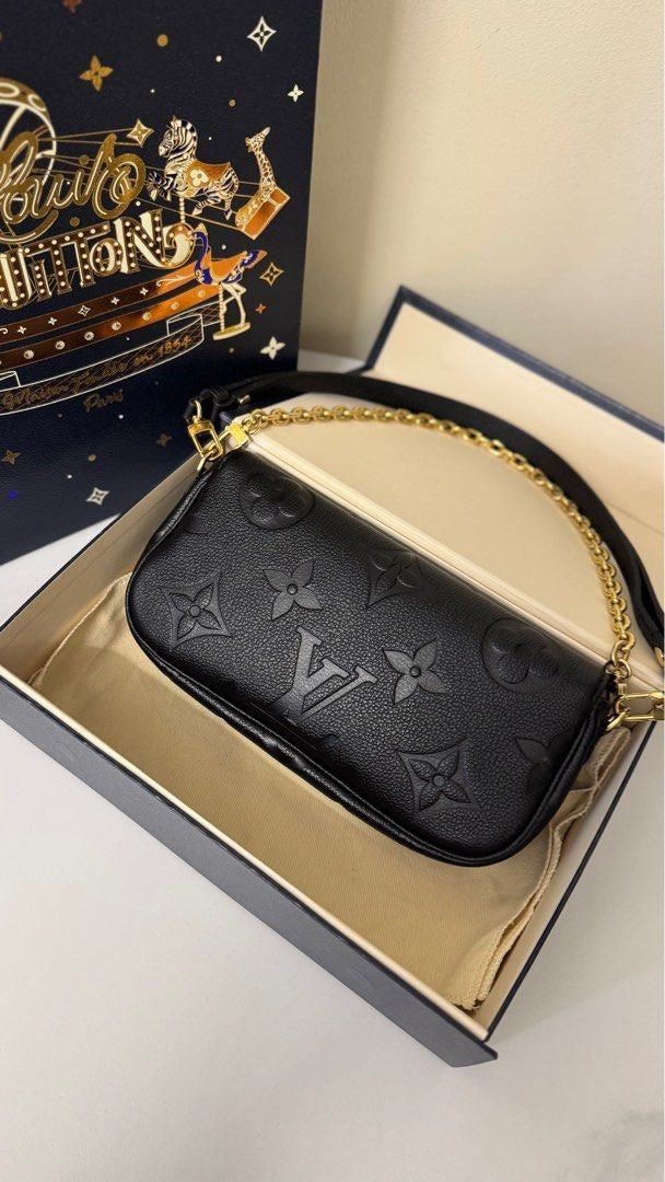 Louis Vuitton	Ivy Wallet on Chain Empreinte