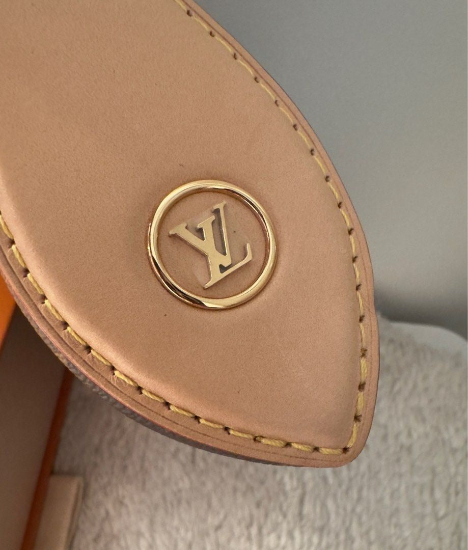 Louis Vuitton	Tirette Pochette Monogram