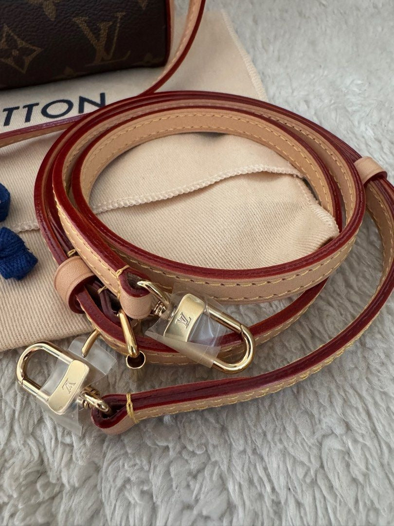 Louis Vuitton	Tirette Pochette Monogram